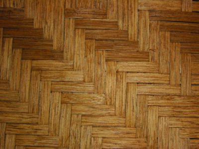 closeup of reed seating, also called splint or split, in a herringbone pattern